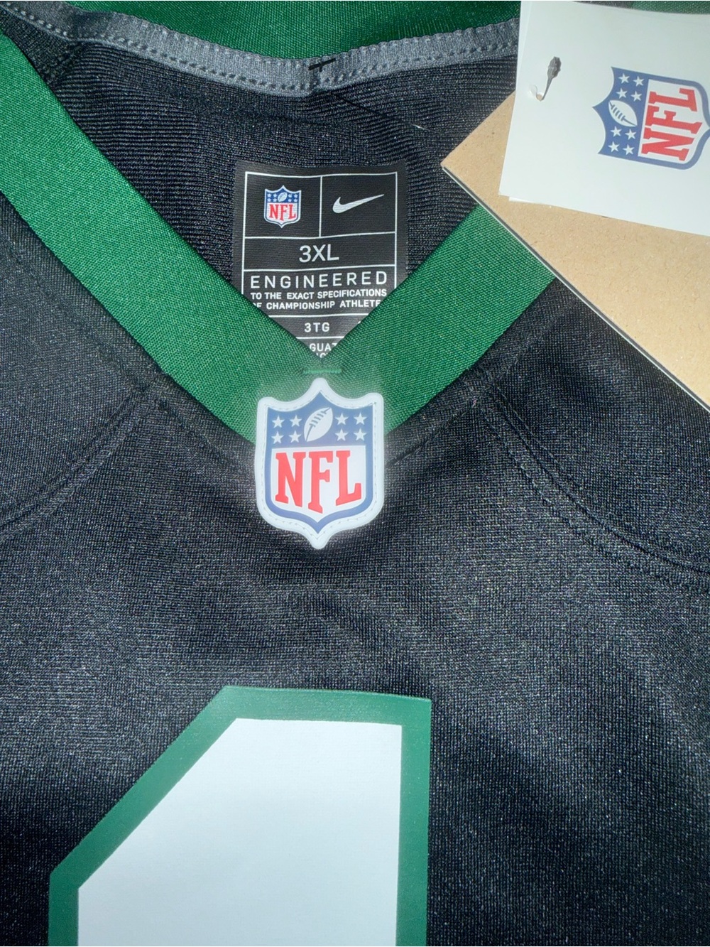NFL Men’s Black Jersey with Green Trim and White Number 1 - Picture 3 of 3